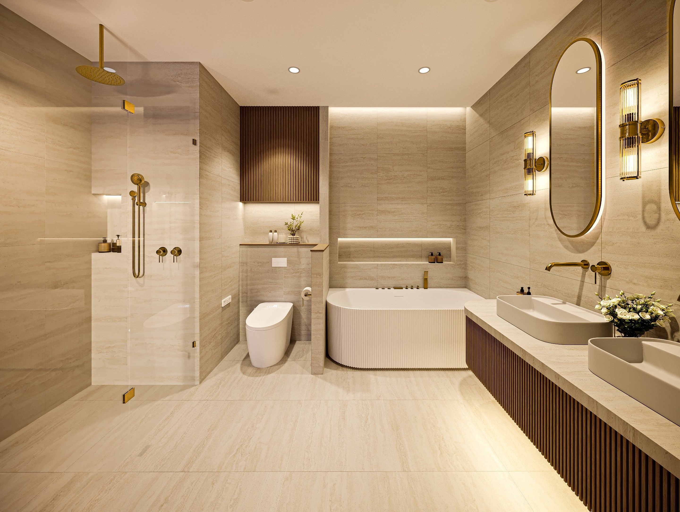 Master ensuite in natural stone, with a ribbed bath, walk-in shower and double vanity with brass fittings.
