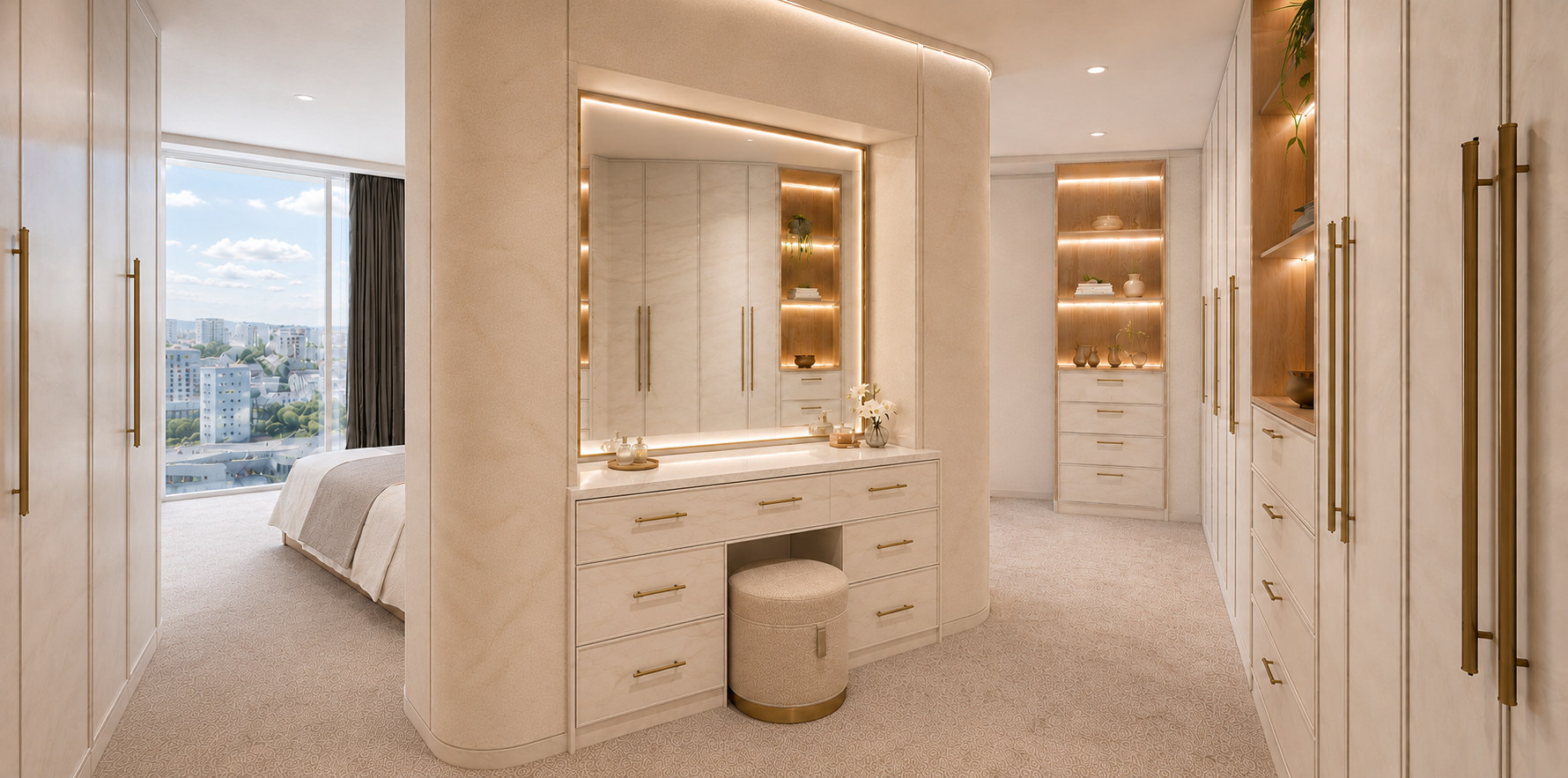 Southern master suite dressing area, with a lit vanity mirror, stool and full-height robes with brass handles, the bedroom and city view beyond.