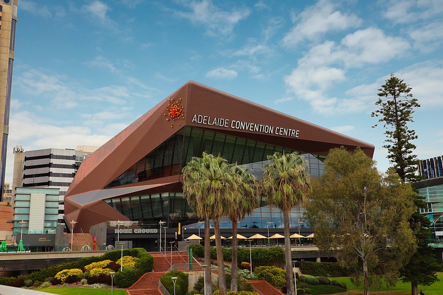 The Adelaide Convention Centre above the riverbank gardens.